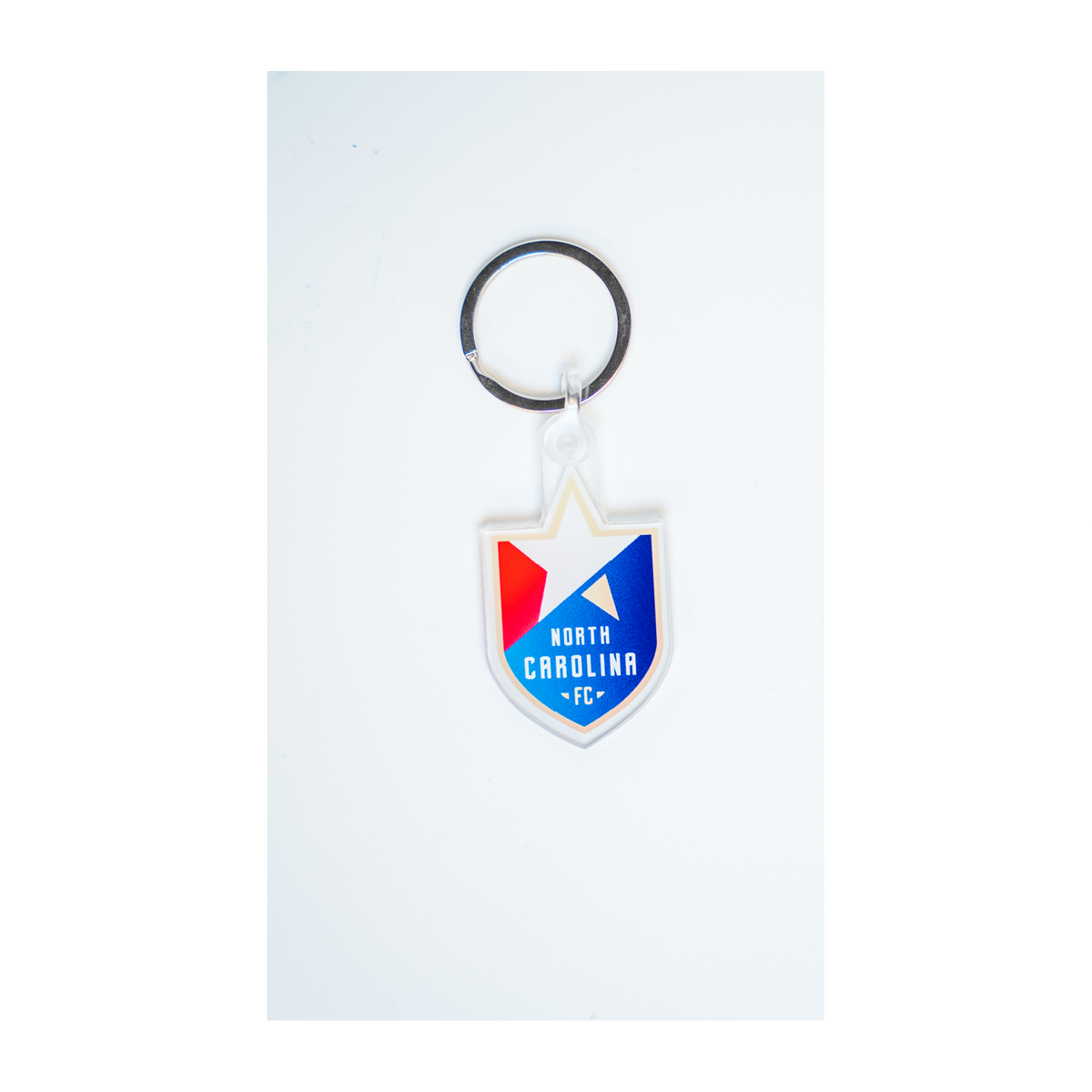 http://store.northcarolinafc.com/cdn/shop/files/NCFC_Acrylic_Keychain_ee1633b3-a94f-40e7-b5f5-608bba01469a_1200x1200.png?v=1696363999